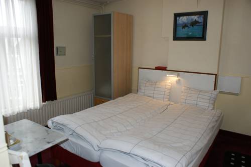 Imagen de la habitación del Hotel Hotel De Westertoren. Foto 7