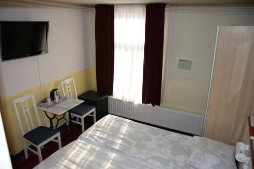 Imagen de la habitación del Hotel Hotel De Westertoren. Foto 13