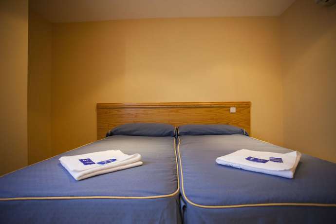 Imagen de la habitación del Hotel Hotel El Álamo. Foto 10