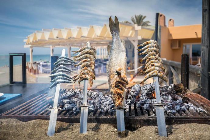 Imagen del bar/restaurante del Hotel Hotel Guadalmina. Foto 8