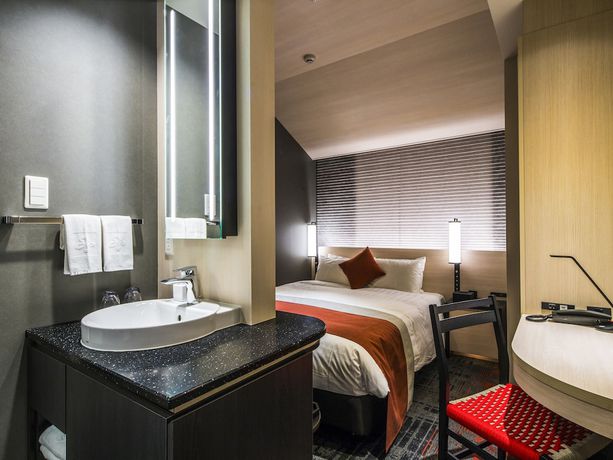 Imagen de la habitación del Hotel Hotel Hankyu RESPIRE OSAKA. Foto 13