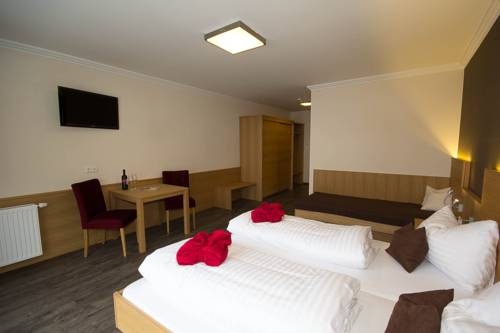 Imagen de la habitación del Hotel Hotel Herzblut Saalbach. Foto 42