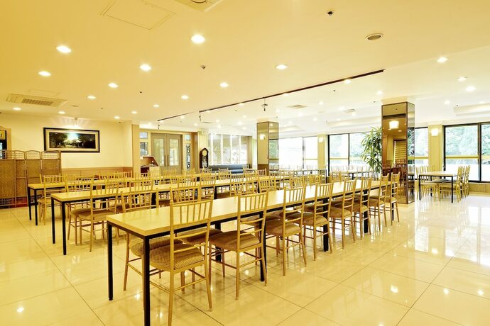 Imagen del bar/restaurante del Hotel Hotel Honey Crown. Foto 3