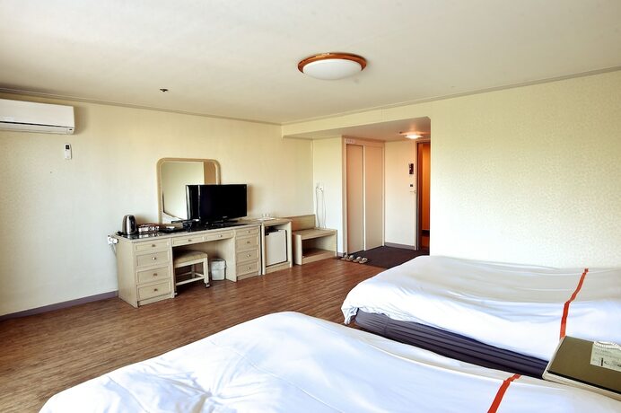 Imagen de la habitación del Hotel Hotel Honey Crown. Foto 5
