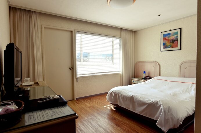 Imagen de la habitación del Hotel Hotel Honey Crown. Foto 6