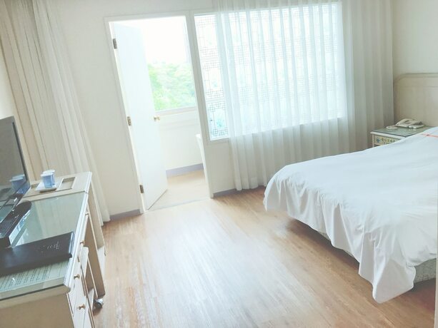 Imagen de la habitación del Hotel Hotel Honey Crown. Foto 7