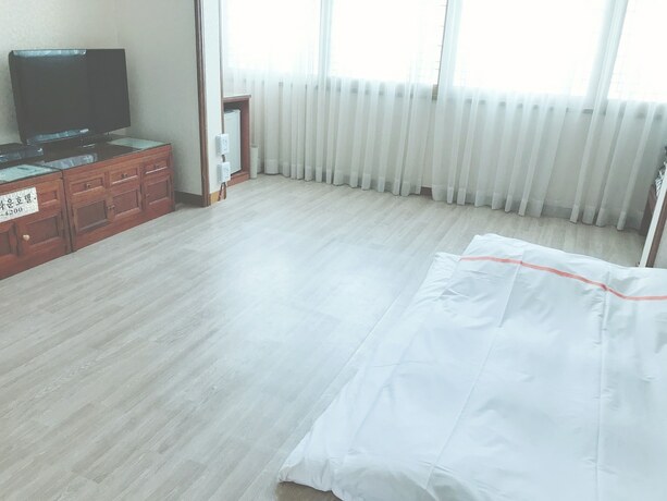 Imagen de la habitación del Hotel Hotel Honey Crown. Foto 12