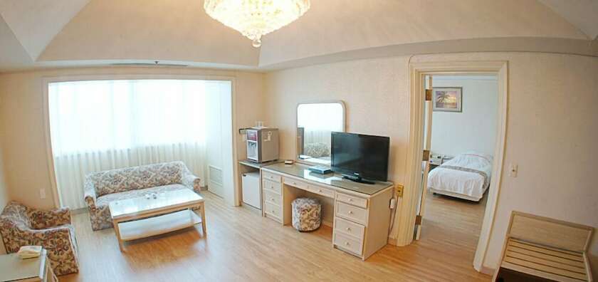 Imagen de la habitación del Hotel Hotel Honey Crown. Foto 17