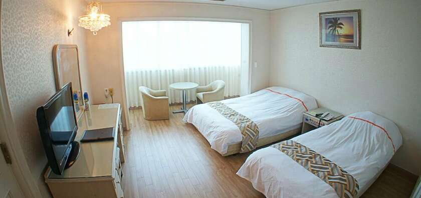 Imagen de la habitación del Hotel Hotel Honey Crown. Foto 18
