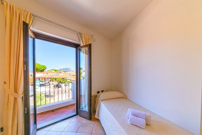 Imagen de la habitación del Hotel Hotel Il Faro di Molara. Foto 6