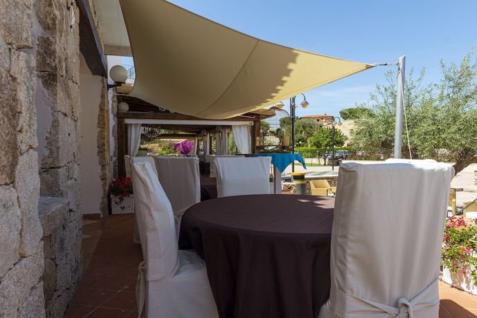 Imagen del bar/restaurante del Hotel Hotel Il Faro di Molara. Foto 3