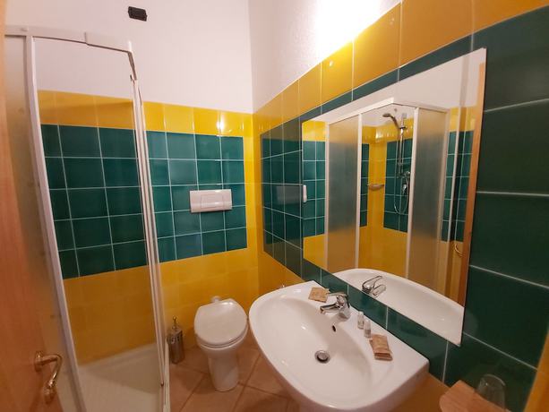 Imagen de la habitación del Hotel Hotel Il Faro di Molara. Foto 12