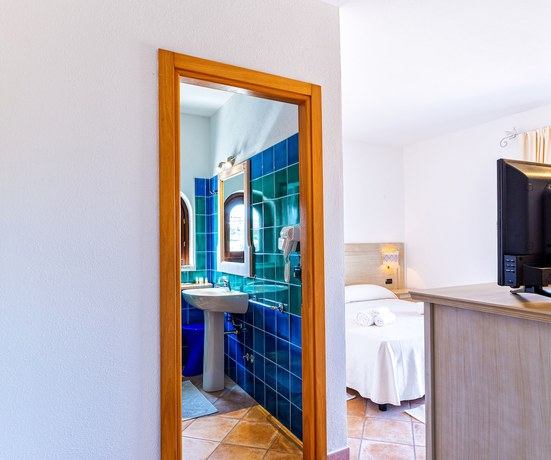 Imagen de la habitación del Hotel Hotel Il Faro di Molara. Foto 13