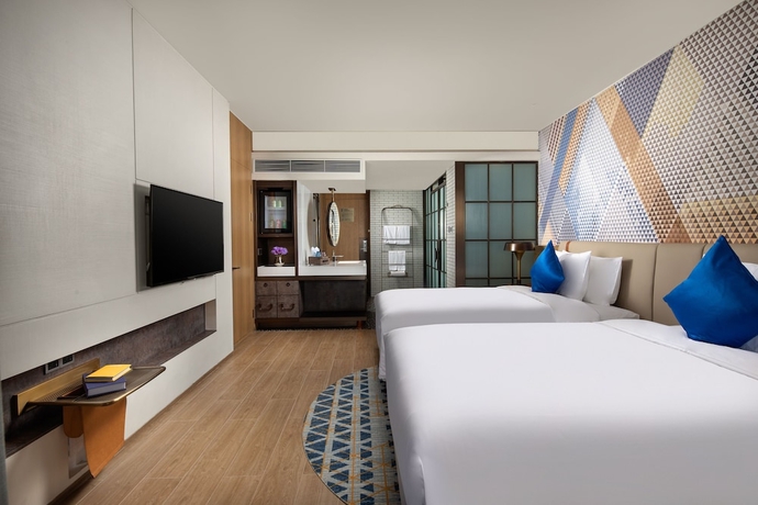 Imagen de la habitación del Hotel Hotel Indigo Hainan Xiangshui BAY. Foto 4