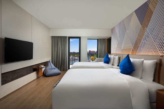 Imagen de la habitación del Hotel Hotel Indigo Hainan Xiangshui BAY. Foto 11