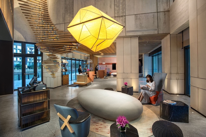 Imagen de los interiores del Hotel Hotel Indigo Hainan Xiangshui BAY. Foto 17