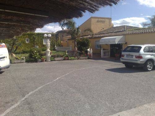 Imagen de los exteriores del Hotel Hotel Iris, Eliana. Foto 13