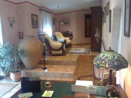 Imagen del bar/restaurante del Hotel Hotel Iris, Eliana. Foto 6