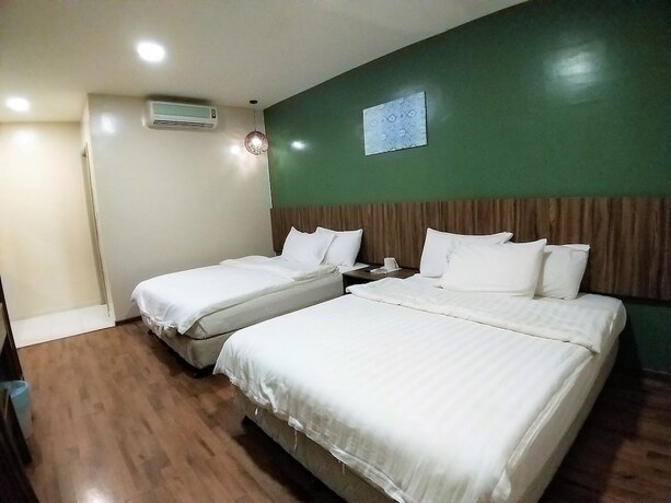 Imagen de la habitación del Hotel Hotel Jelai Raub. Foto 18