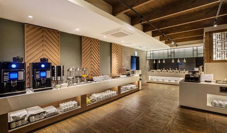 Imagen del bar/restaurante del Hotel Hotel Kennystory Premium Jeju Yeondong. Foto 6