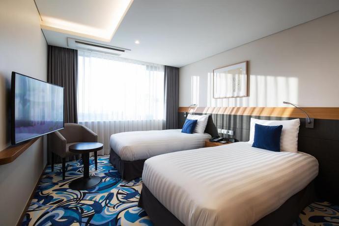 Imagen de la habitación del Hotel Hotel Kennystory Premium Jeju Yeondong. Foto 11