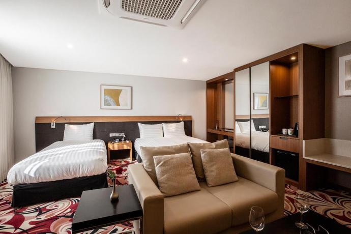 Imagen de la habitación del Hotel Hotel Kennystory Premium Jeju Yeondong. Foto 12