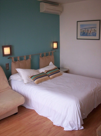 Imagen de la habitación del Hotel Hotel Le Bon Port. Foto 4