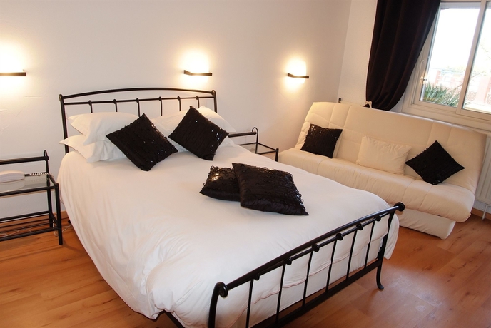 Imagen de la habitación del Hotel Hotel Le Bon Port. Foto 5