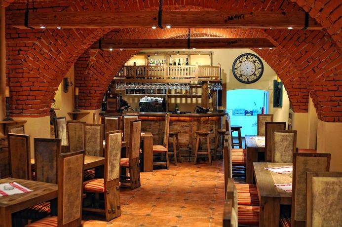 Imagen del bar/restaurante del Hotel Hotel Leul De Aur. Foto 2