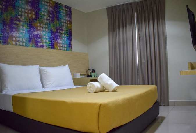 Imagen de la habitación del Hotel Hotel Living At Dsulaiman. Foto 6