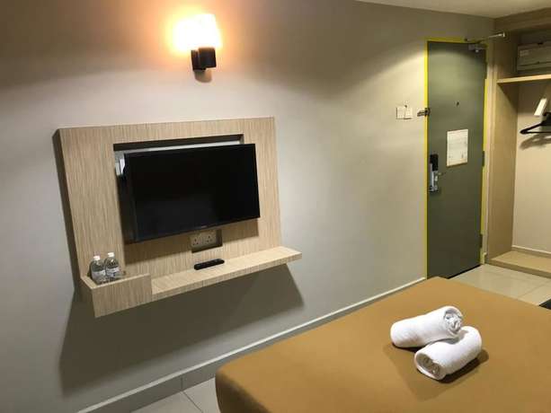 Imagen de la habitación del Hotel Hotel Living At Dsulaiman. Foto 9