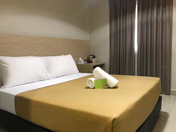 Imagen de la habitación del Hotel Hotel Living At Dsulaiman. Foto 10