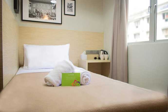 Imagen de la habitación del Hotel Hotel Living At Dsulaiman. Foto 11
