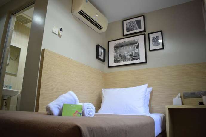 Imagen de la habitación del Hotel Hotel Living At Dsulaiman. Foto 12