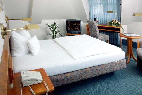 Imagen de la habitación del Hotel Hotel L&ouml;wen-Seckenheim. Foto 14