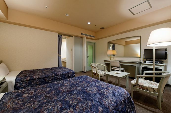 Imagen de la habitación del Hotel Hotel Machida Villa. Foto 8