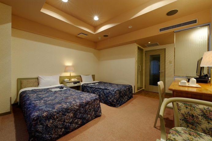 Imagen de la habitación del Hotel Hotel Machida Villa. Foto 10