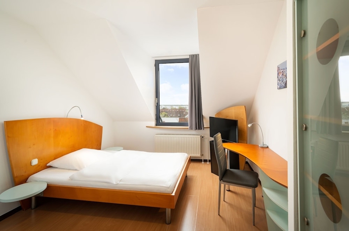 Imagen de la habitación del Hotel Hotel Mainstreet. Foto 3