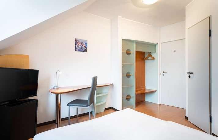 Imagen de la habitación del Hotel Hotel Mainstreet. Foto 4