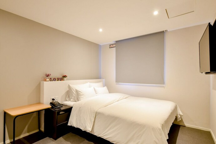 Imagen de la habitación del Hotel Hotel Maison. Foto 19