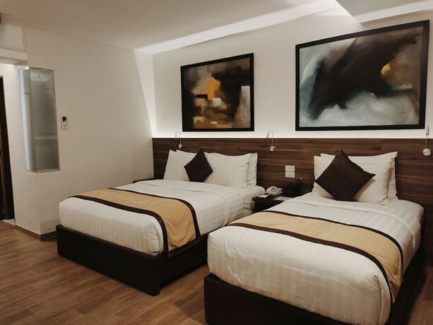 Imagen de la habitación del Hotel Hotel Marciano. Foto 17