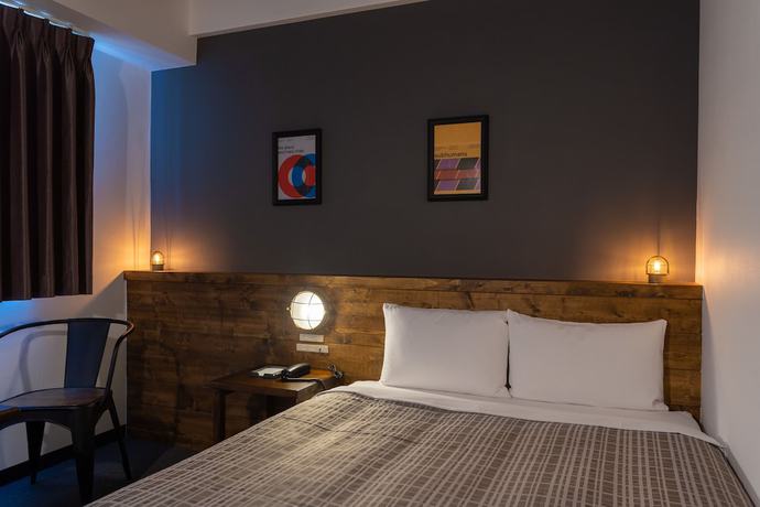 Imagen de la habitación del Hotel Hotel Maruki. Foto 4