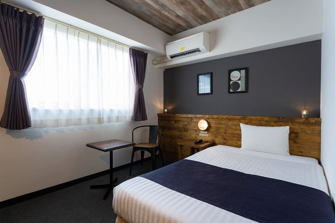 Imagen de la habitación del Hotel Hotel Maruki. Foto 10