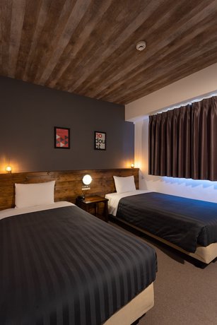 Imagen de la habitación del Hotel Hotel Maruki. Foto 12