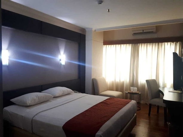 Imagen de la habitación del Hotel Hotel Mega Cikini. Foto 6