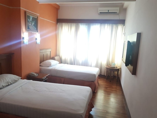Imagen de la habitación del Hotel Hotel Mega Cikini. Foto 8