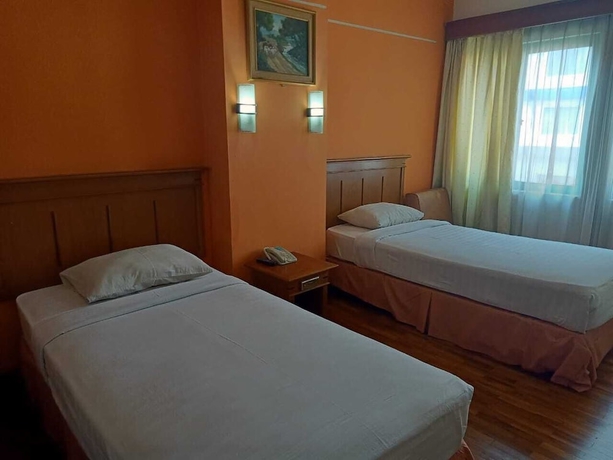 Imagen de la habitación del Hotel Hotel Mega Cikini. Foto 13