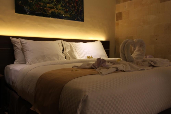 Imagen de la habitación del Hotel Hotel Melamun. Foto 6