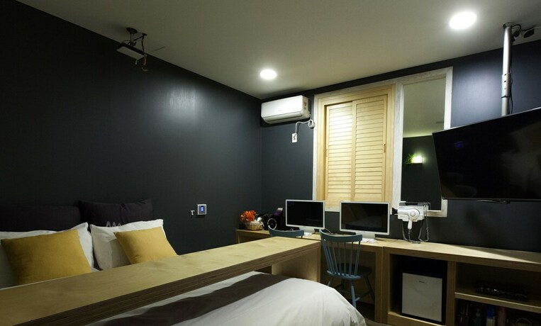 Imagen de la habitación del Hotel Hotel Merci. Foto 19