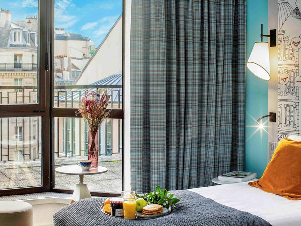 Imagen de la habitación del Hotel Hotel Mercure Paris Centre Gare Montparnasse. Foto 17